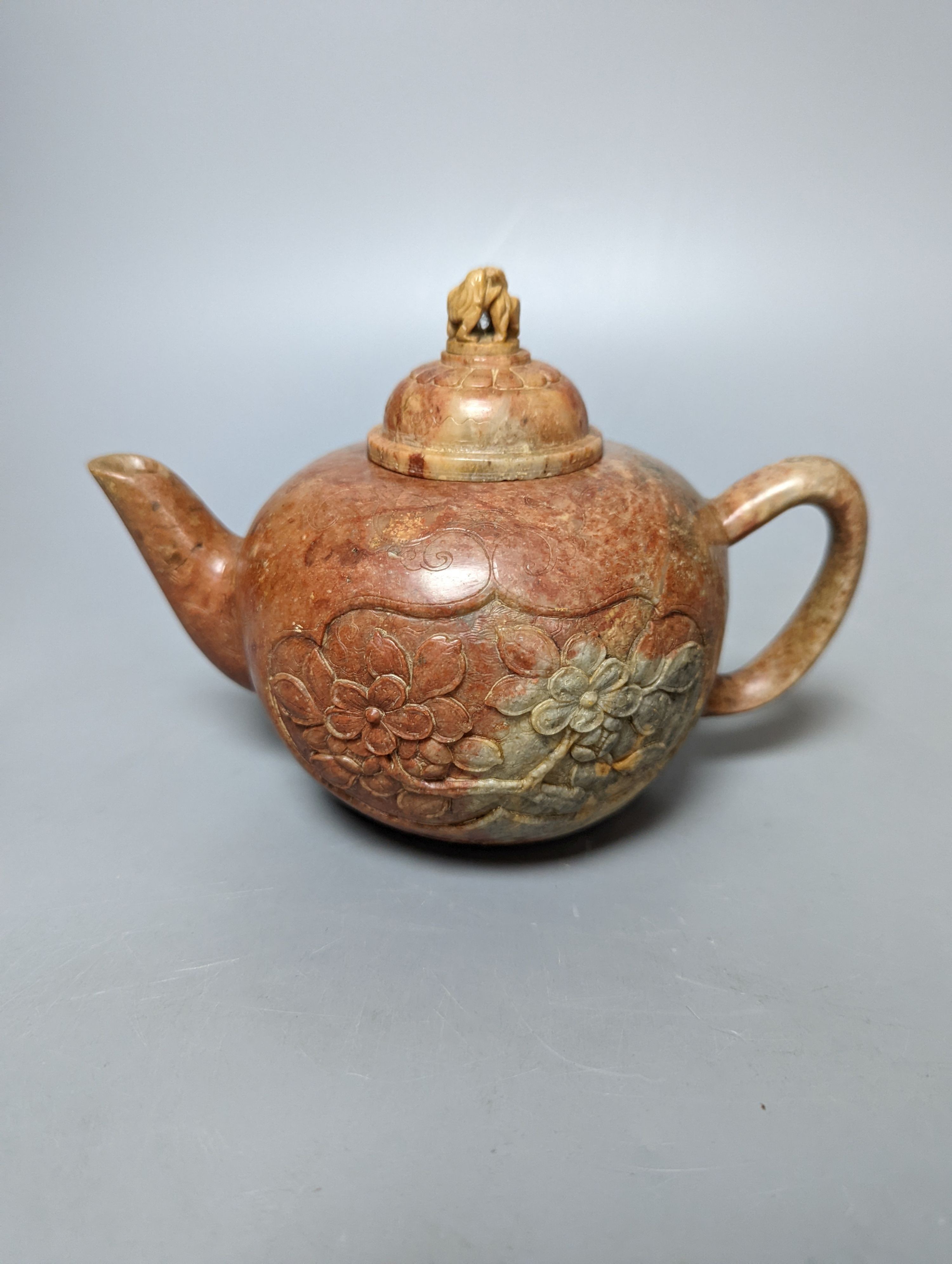 Three Chinese Yixing teapots and a carved soapstone teapot tallest 12cm